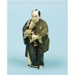 A well carved antique Japanese ivory ok