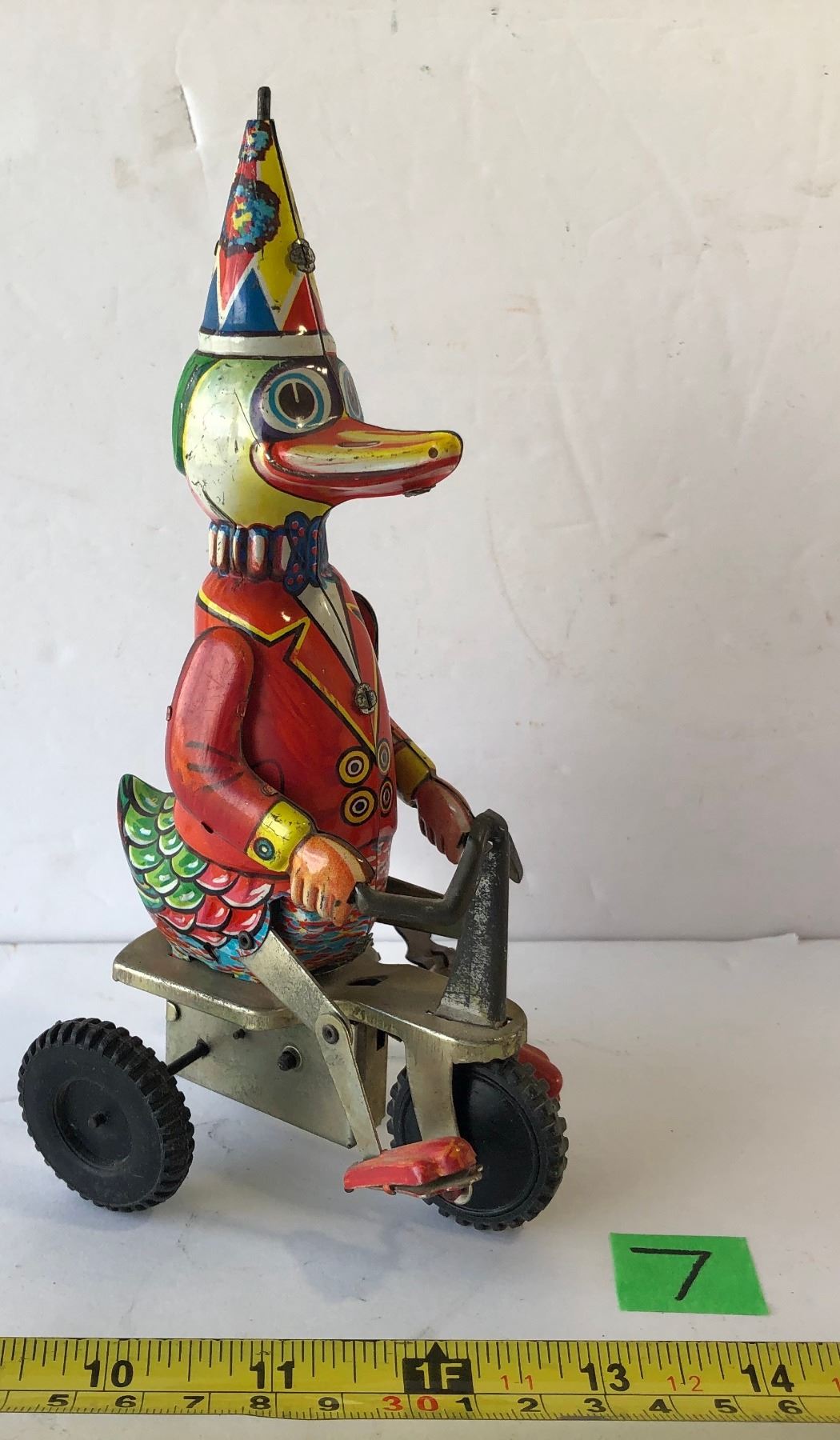 Duck Riding Toy VINTAGE WINDUP TIN TOY - DUCK RIDING A BIKE - Kidd Family Auctions