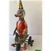 Image 2 : VINTAGE WINDUP TIN TOY - DUCK RIDING A BIKE