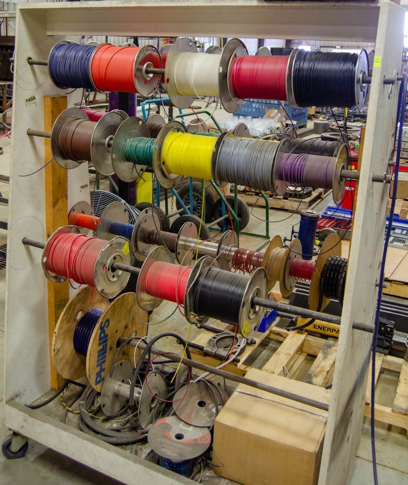 SPOOL RACK W/ 32 ASSORTED GAUGE WIRE SPOOLS