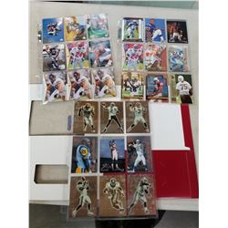 BINDER OF 27 NFL ROOKIE CARDS