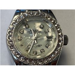 Ladies Rolex wrist watch sold without certification documents. interior jewels loose