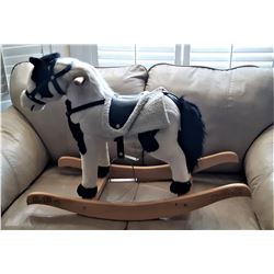 27) BLACK AND WHITE PLUSH ROCKING HORSE