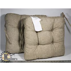 A PAIR OF NEW CHAIR CUSHIONS