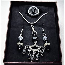 1) SUITE OF BLACK AND CLEAR ZIRCON AND