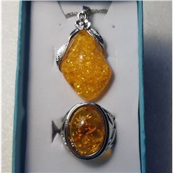 22)  BALTIC AMBER FLOWER PENDANT ON 16"