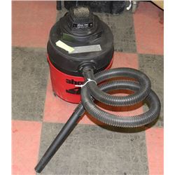 SHOP VAC- 4 GALLON WITH HOSE