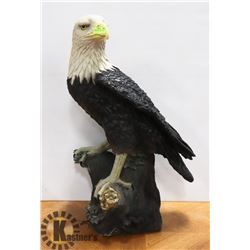 LARGE EAGLE ON TREE STUMP