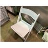 Image 3 : STACK OF 32 WHITE FOLDING EVENT CHAIRS ON MOBILE CHAIR CART