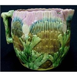 American majolica pitcher; shell and co