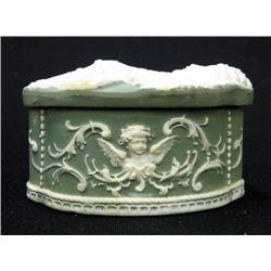 Green jasperware dresser box; raised ca