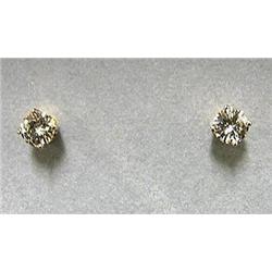 Pair of diamond stud earrings approxima