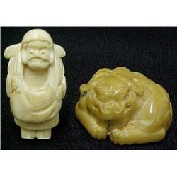 Carved ivory netsuke and an Oriental fi