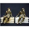 Image 1 : A pair of spelter figural bookends on a