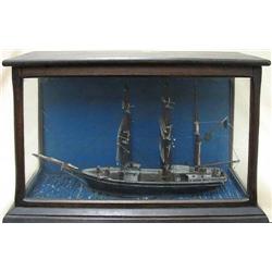 Clipper ship model in case; depicting s