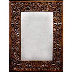 Carved walnut framed mirror; rectangula