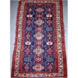 Hand tied Oriental rug; geometric desig