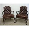 Image 1 : A pair of walnut and brown leather upho