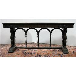 Walnut library table; carved banding ar