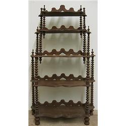 Walnut Victorian étagère; scalloped cre