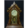Image 1 : Walnut cased gingerbread shelf clock by