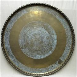 Brass charger with Middle Eastern engra