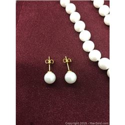 Elegant Matching Pearl Necklace And Earrings