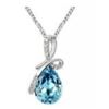 Image 1 : Austrian Crystal with Swarovski Elements - Tear drop shaped gem w/ribbon of clear gems above-Sapphir
