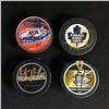 Image 1 : 4 SIGNED NHL HOCKEY PUCKS (BABCOCK, SCHNEIDER,LUPAL JOHNSON)