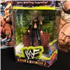 Image 2 : PROFESSIONAL WRESTLING COLLECTIBLES LOT (WWE OFFICIAL PROGRAMS, WWF ACTION FIGURE)