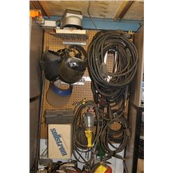 HEAVY CORDS, WELDING HELMETS HANGING ON THE WALL & CUTTING TIPS