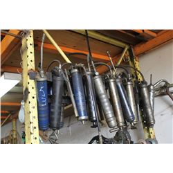 GREASE GUNS, COME ALONGS HANGING ON PALLET RACKING