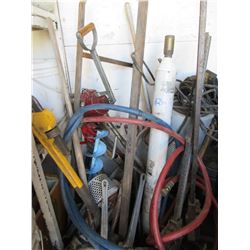 QUANTITY OF HAND TOOLS, PIPE WRENCHES, ICE AUGER, & WHITE PUMP