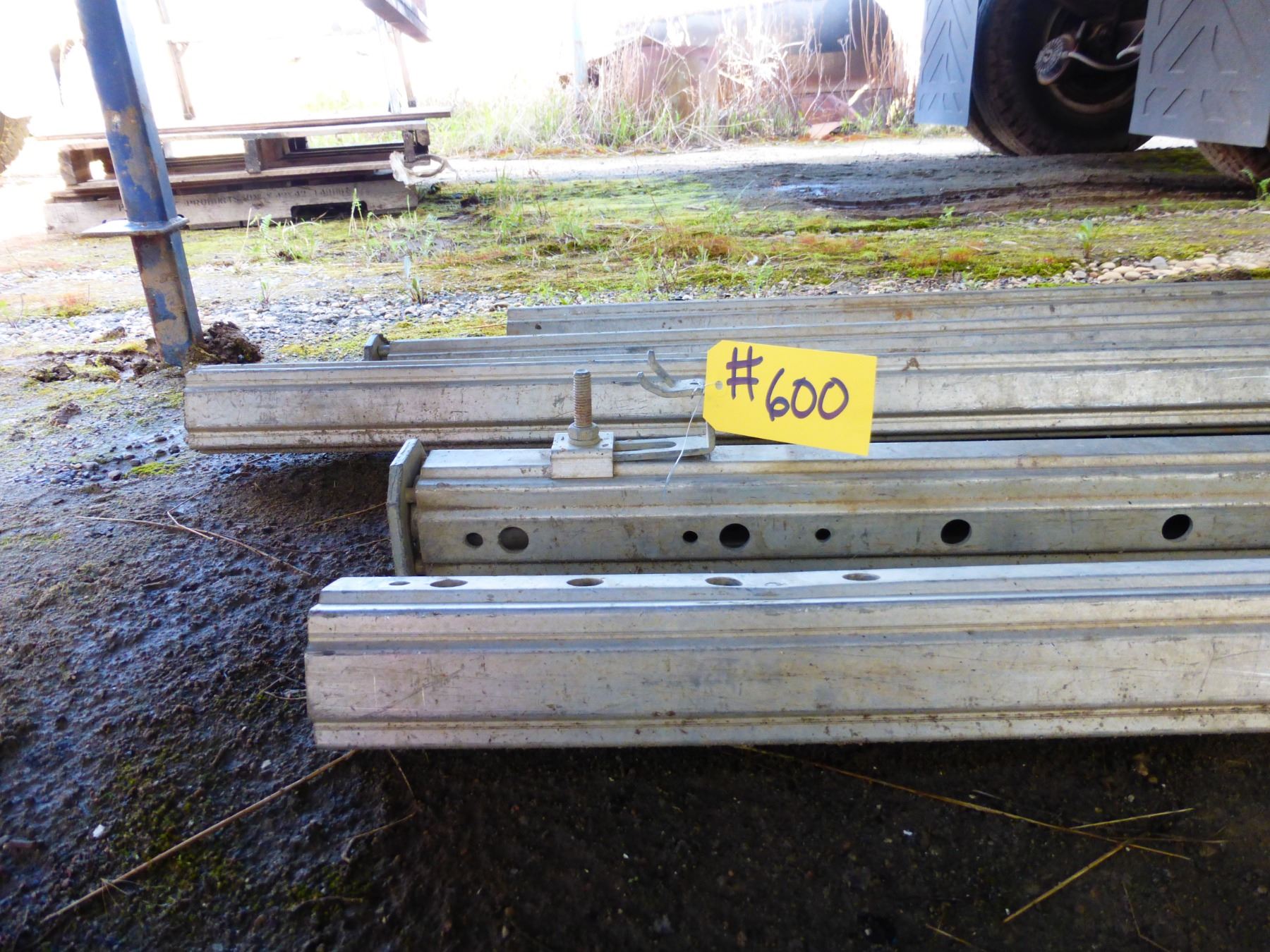 5 ALUMINUM RAILS UNDER TRAILER #255