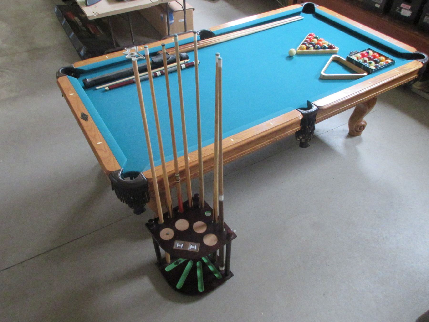 8' 2" X 4' 7" Pool Table 2 Sets of Balls 2 Racks 10 Cues 1 Bridge