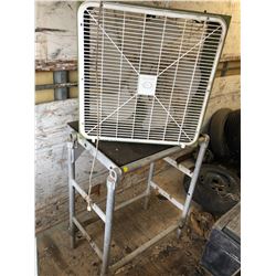 Metal Workbench, Fan, and Pioneer Chainsaw