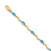 Image 1 : 14k Yellow Gold Fancy Diamond/Blue Topaz Bracelet - 7 in.