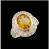 Image 1 : 14KW Gold 4.09ct Oval Citrine/Diamond Ring