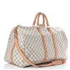 Image 2 : Louis Vuitton Monogram Toile Canvas Bandouliere Keepall 55 Duffel Bag