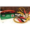 89  SONIC 6 AM BATTERY CHARGER, JUMPER CABLES and EXT CORD.