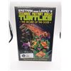 Image 1 : Teenage Mutant Ninja Turtles Official Movie Adaptation in Bag on White Board