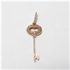 Image 1 : 10K Rose Gold & Diamond Key Pendant.  Pendant measures 1 1/4" in length with a total weight of 0.91 