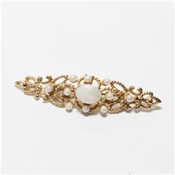 Lady's Vintage 10K Yellow Gold Opal Brooch.  Length of the brooch measures just under 2" in length w