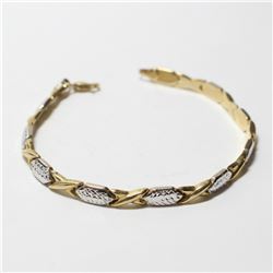 Lady's 10K Yellow & White Gold Fancy Link Bracelet with Lobster Clasp.  Bracelet measures 7 1/2  in 