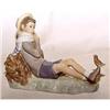 Image 1 : Llardo reclining boy with little bird on foot #893310