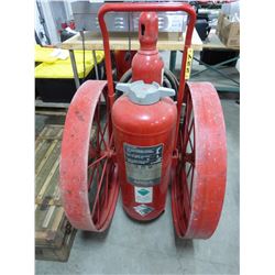 ANTIQUE ANSUL FIRE EXTIGUISHER ON CAST WHEELS WITH HOSE