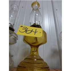 ANTIQUE AMBER BASE OIL LAMP C/W CHIMNEY