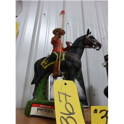 PREMIUM POTTERS RCMP HORSE LIQUOR BOTTLE