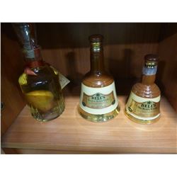 3 DECANTERS INCLUDING PEAR IN BOTTLE & 2 OLD SCOTCH BELLS