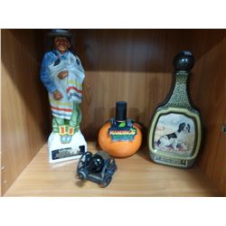 4 DECANTERS INCLUDING JIM BEAM, MANDIGO, CANON & NATIVE CHIEF